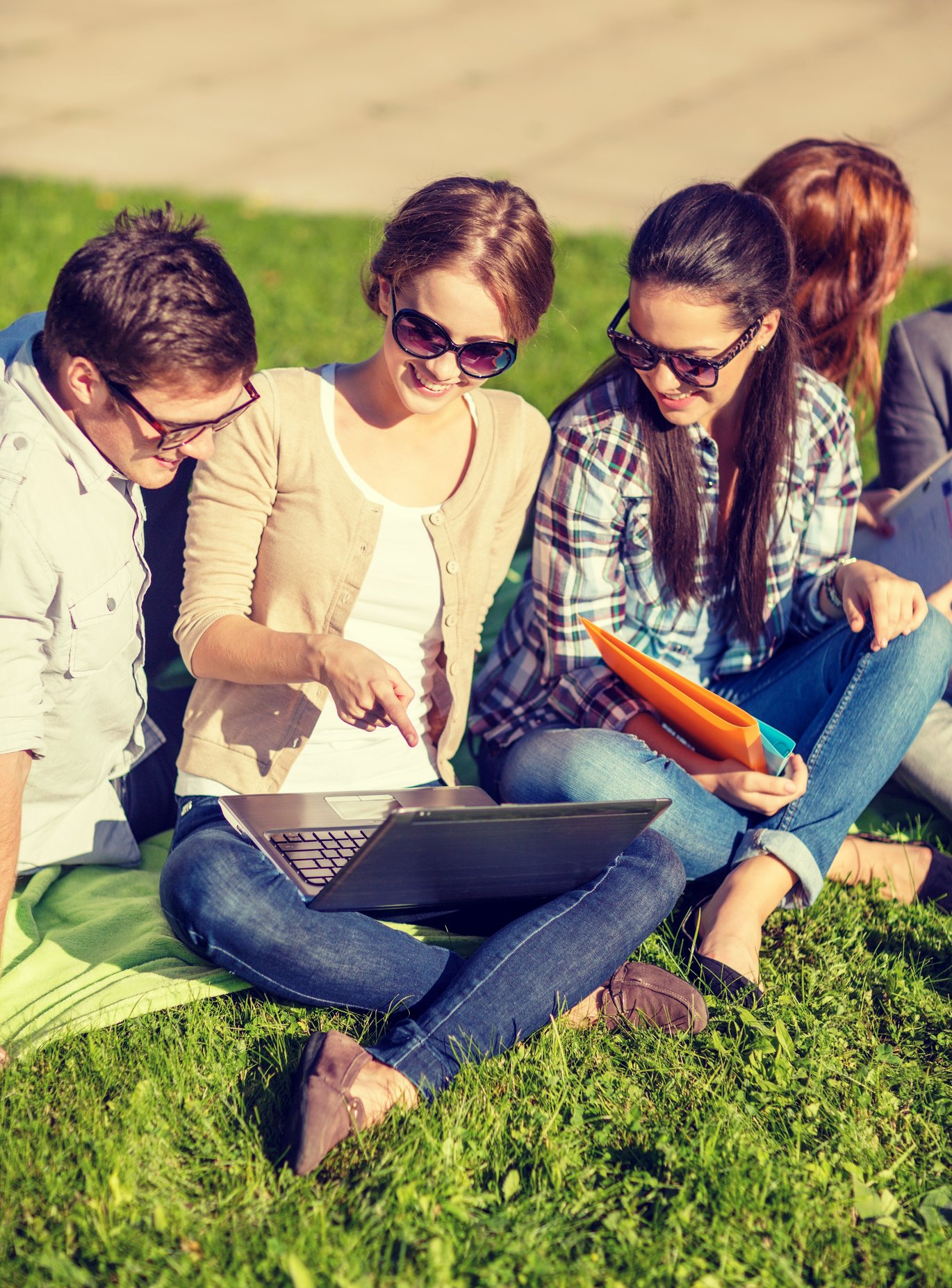 Students in the grass