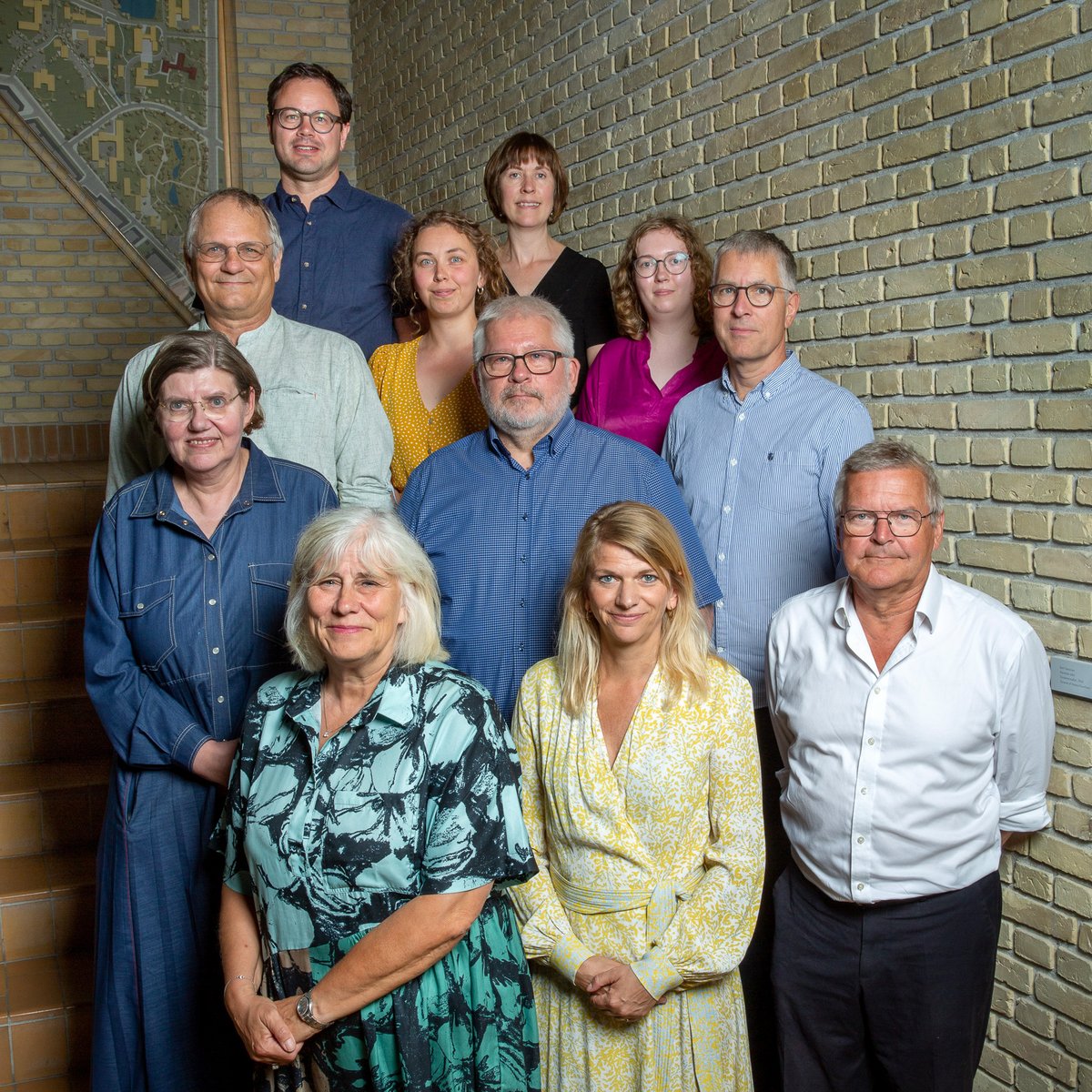 Bestyrelsen på Aarhus Universitet samlet på en trappe.
